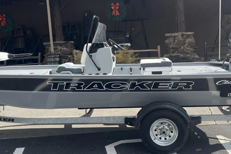 Slide: The Image of 2026 Tracker Bass Tracker Classic CC boat on trailer, side view. - 2