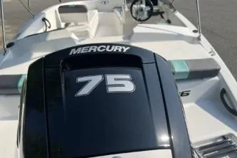 Slide: The Image of 2026 Tahoe T16 boat with Mercury 75 engine, featuring sleek design and modern amenities. - 7
