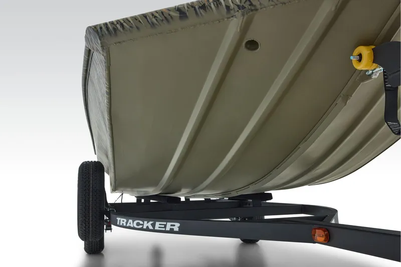 Slide: The Image of 2026 Tracker Grizzly 1756 T Marsh boat with camo design and seating. - 9