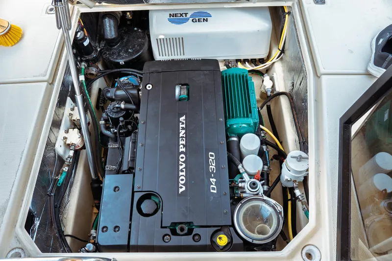 Slide: The Image of Engine compartment of 2022 Ranger Tugs R-29 S with Volvo Penta D4-320 engine. - 14