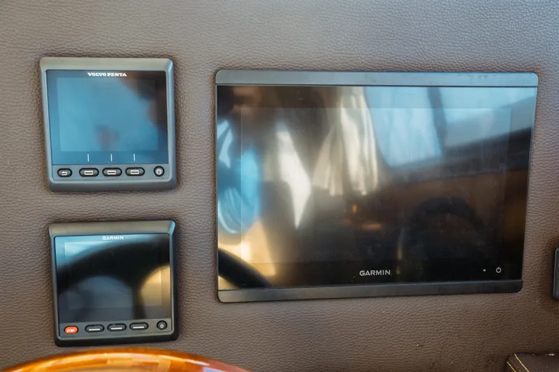 Slide: The Image of Control panel of 2022 Ranger Tugs R-29 S with Garmin and Volvo Penta displays. - 34