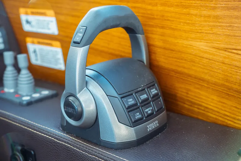 Slide: The Image of Volvo Penta throttle control on 2022 Ranger Tugs R-29 S boat dashboard. - 36