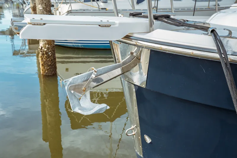 Slide: The Image of 2022 Ranger Tugs R-29 S boat with anchor at marina. - 6