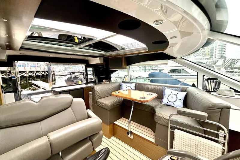 Slide: The Image of Luxurious interior of 2014 Cruisers Yachts 45 Cantius with leather seating and panoramic windows. - 10