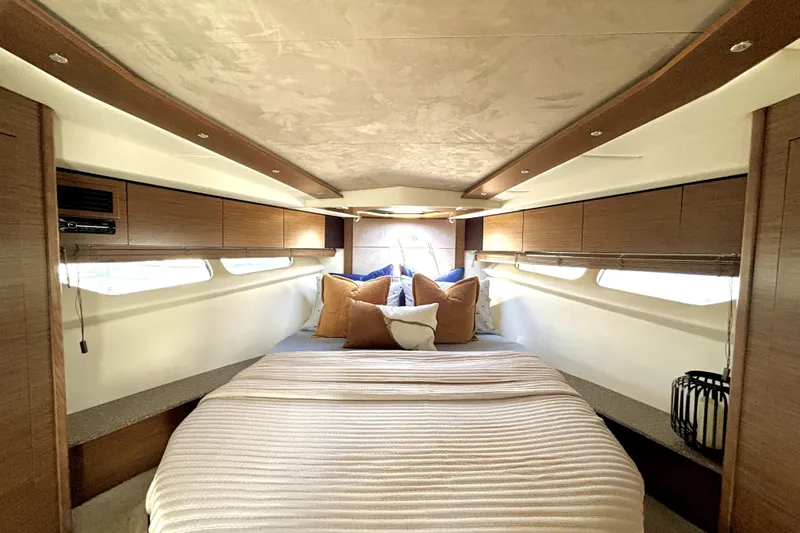 Slide: The Image of Luxurious cabin interior of 2014 Cruisers Yachts 45 Cantius with cozy bedding. - 14