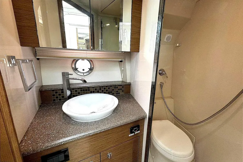 Slide: The Image of Luxurious bathroom in 2014 Cruisers Yachts 45 Cantius with modern fixtures and elegant design. - 16
