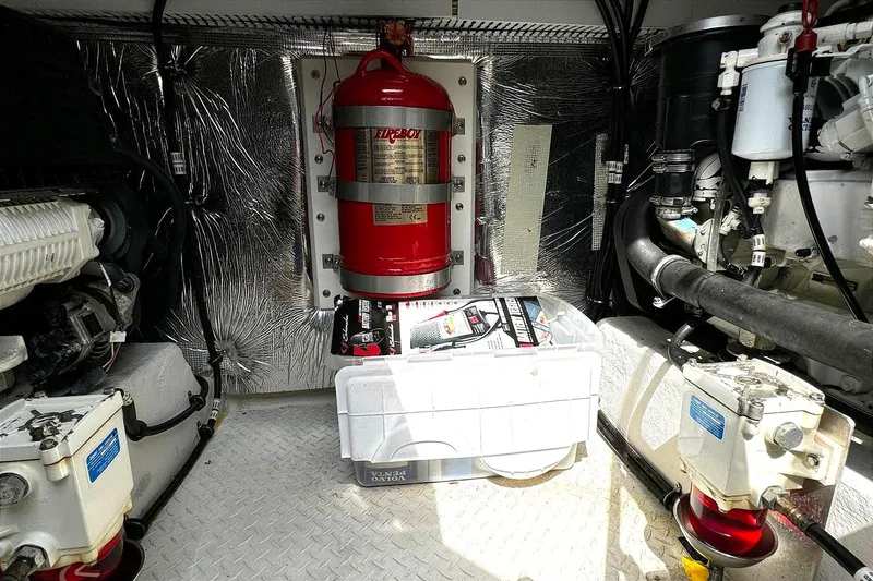 Slide: The Image of Engine room of 2014 Cruisers Yachts 45 Cantius with fire suppression system and equipment. - 22