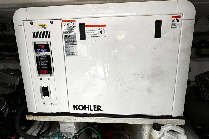 Slide: The Image of Kohler generator in 2014 Cruisers Yachts 45 Cantius engine room. - 23