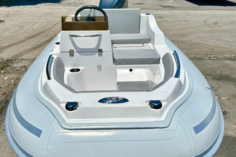 Slide: The Image of 2025 AB Inflatables Nautilus 11 DLX boat with sleek design and modern seating. - 7