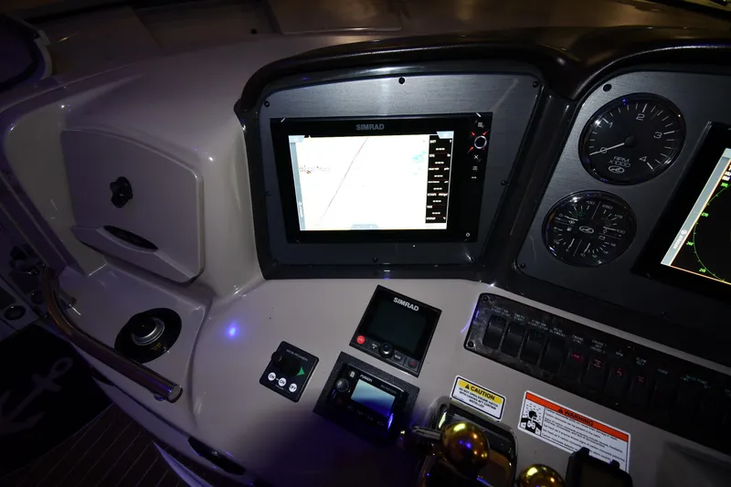Slide: The Image of Control panel of a 2006 Sea Ray 40 Sundancer with Simrad navigation system. - 10