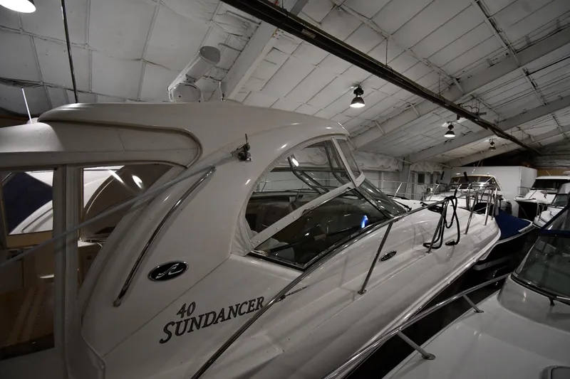 Slide: The Image of 2006 Sea Ray 40 Sundancer yacht in indoor storage facility. - 2