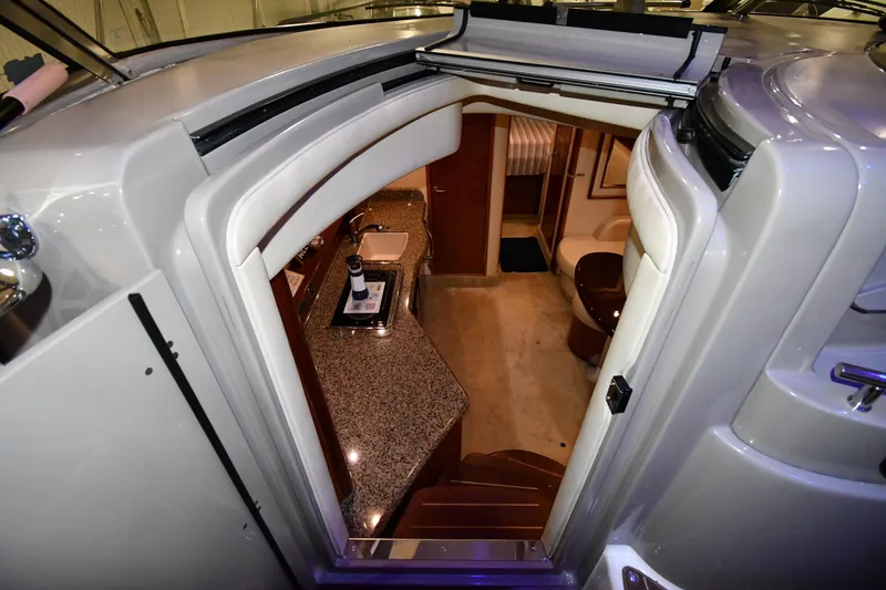 Slide: The Image of Interior view of 2006 Sea Ray 40 Sundancer yacht, featuring a luxurious cabin entrance. - 23