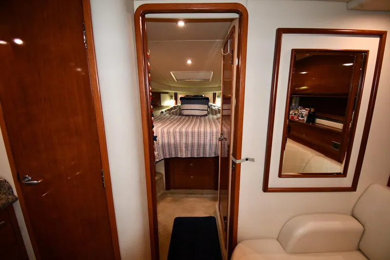 Slide: The Image of Interior of 2006 Sea Ray 40 Sundancer yacht cabin with bed and mirror. - 24