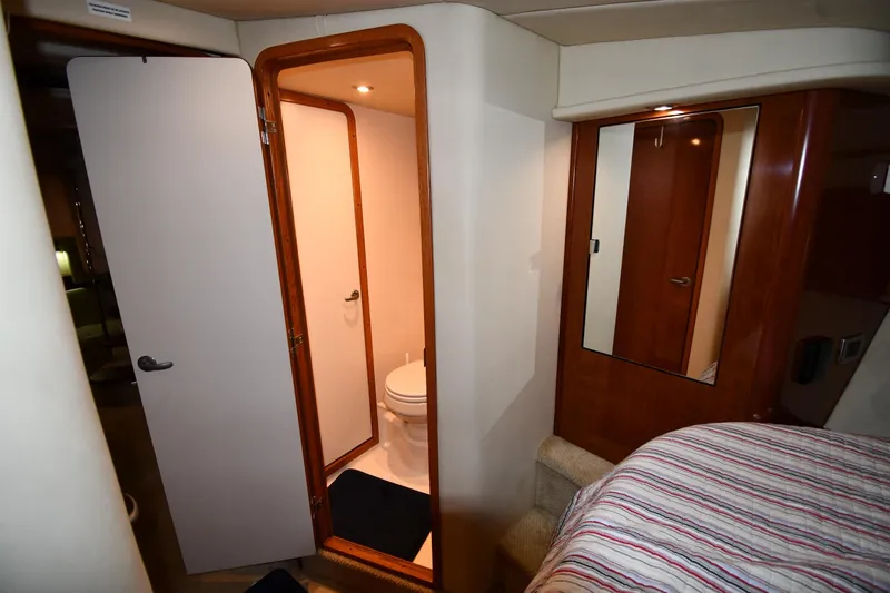 Slide: The Image of Interior of 2006 Sea Ray 40 Sundancer yacht showing bathroom and bedroom area. - 30