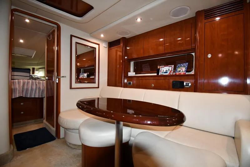 Slide: The Image of Luxurious interior of 2006 Sea Ray 40 Sundancer yacht with elegant wood finishes. - 35