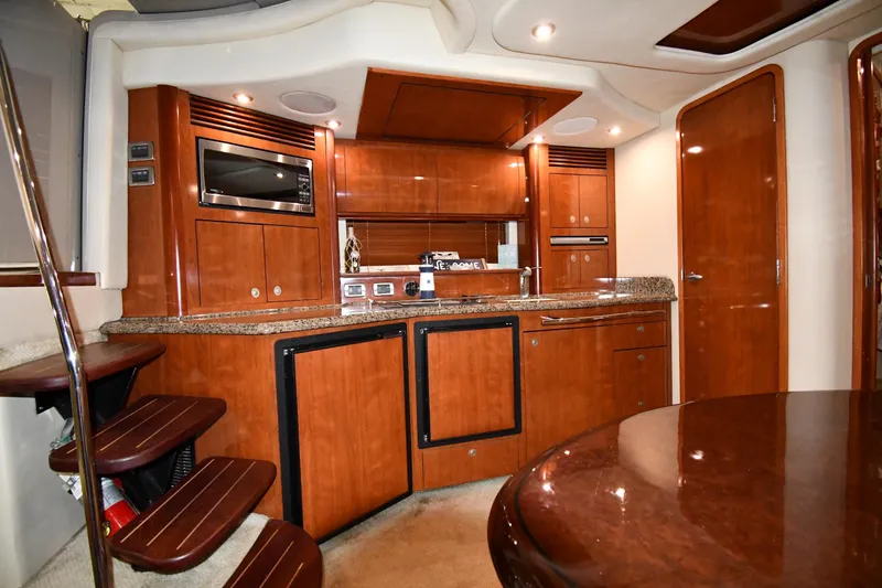 Slide: The Image of Luxurious 2006 Sea Ray 40 Sundancer yacht interior with modern kitchen amenities. - 36