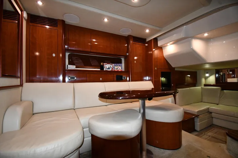 Slide: The Image of Luxurious interior of 2006 Sea Ray 40 Sundancer yacht with elegant wood and leather seating. - 38