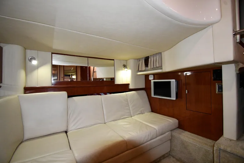 Slide: The Image of Luxurious interior of 2006 Sea Ray 40 Sundancer yacht with white leather seating. - 46
