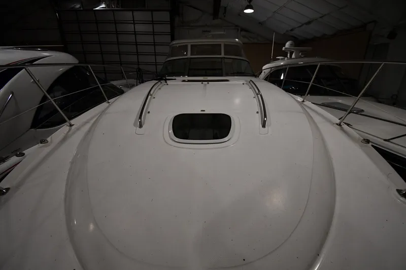 Slide: The Image of 2006 Sea Ray 40 Sundancer yacht in storage, viewed from the bow. - 5