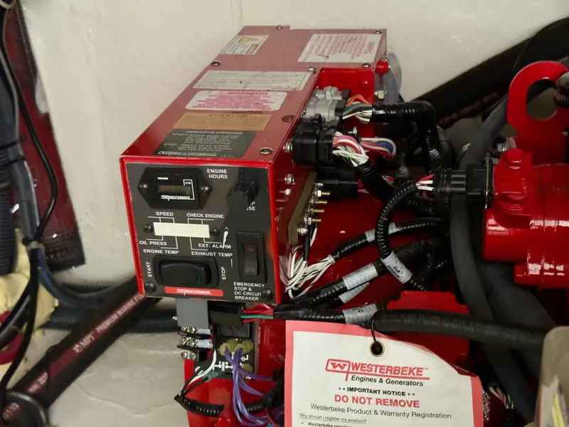 Slide: The Image of Engine control panel of a 2020 Regal 33 Express boat, featuring Westerbeke components. - 18