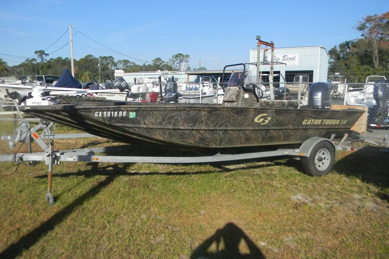 The Image of 2020 G3 Gator Tough 18 CC boat on trailer, parked outdoors. - 0
