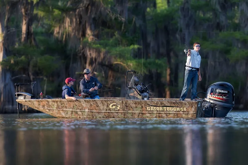 Slide: The Image of Manufacturer Provided Image: 2020 G3 Gator Tough 18 CC boat with people fishing on a lake. - 10