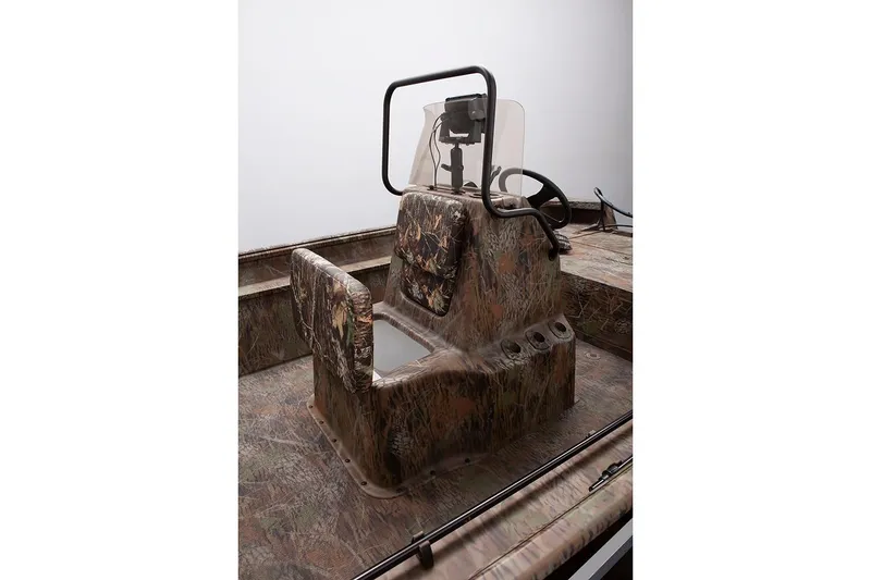 Slide: The Image of Manufacturer Provided Image: 2020 G3 Gator Tough 18 CC boat interior with camouflage design and steering console. - 11