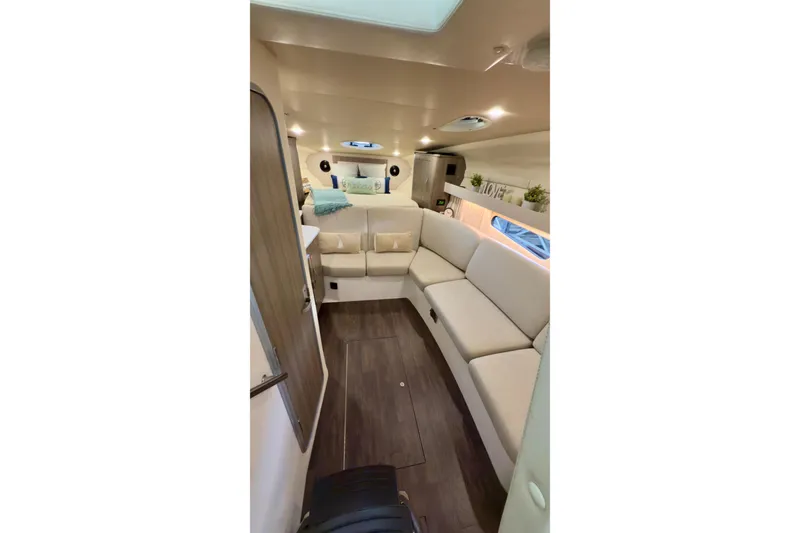 Slide: The Image of Luxurious interior of 2020 Regal 33 Express yacht with plush seating and modern decor. - 11