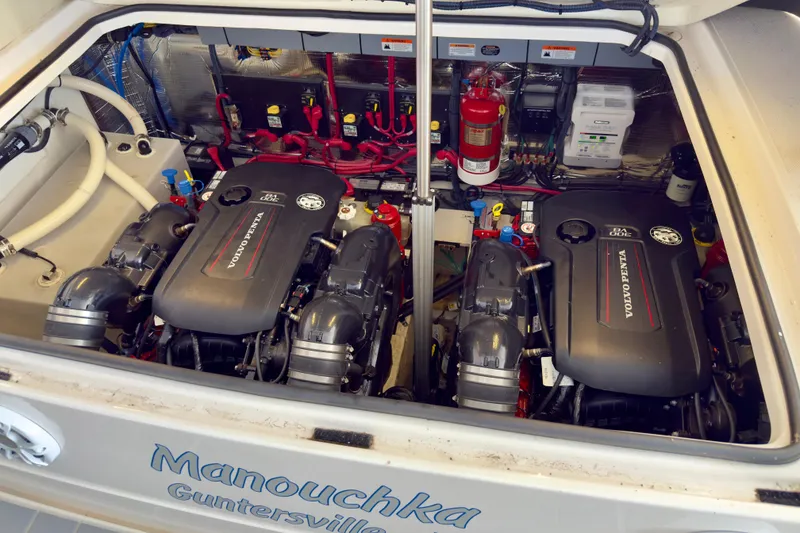 Slide: The Image of Engine compartment of a 2020 Regal 33 Express boat with Volvo Penta engines. - 18