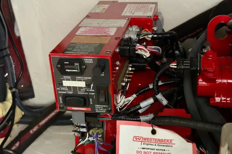 Slide: The Image of Engine control panel of a 2020 Regal 33 Express boat, featuring Westerbeke components. - 19