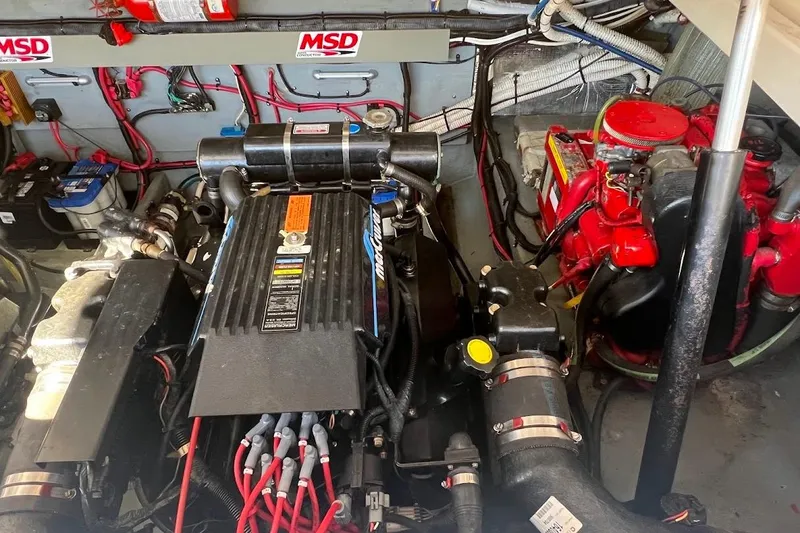 Slide: The Image of Engine room of a 1997 Sea Ray 330 Express with MSD ignition system. - 23