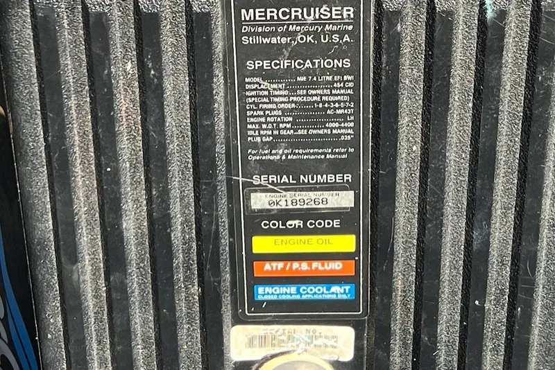 Slide: The Image of Label on a 1997 Sea Ray 330 Express engine, showing specifications and color codes. - 24