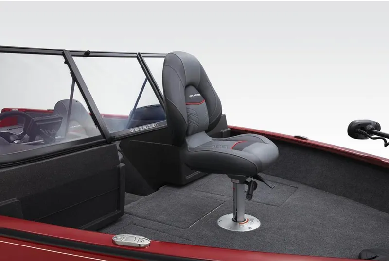 Slide: The Image of 2022 Tracker Pro Guide V-175 Combo boat interior with gray seating and Tracker branding. - 13