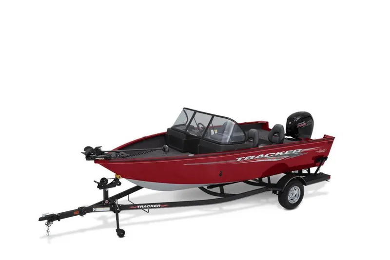 Slide: The Image of Open storage compartment in 2022 Tracker Pro Guide V-175 Combo boat, with visible foot. - 5