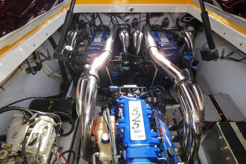 Slide: The Image of Engine compartment of a 2006 Fountain 47 Lightning boat with polished components. - 11