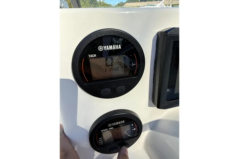 Slide: The Image of Dashboard of 2023 Key West 203 DFS boat with Yamaha tachometer and speed fuel gauges. - 9