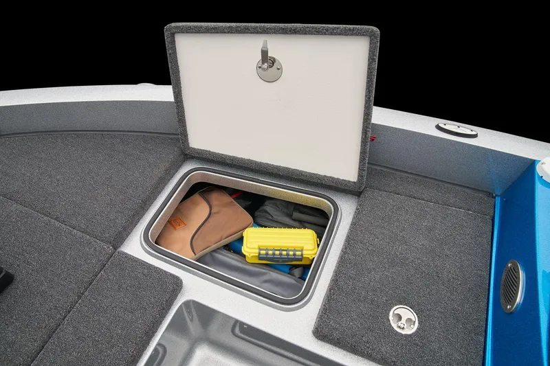 Slide: The Image of Manufacturer Provided Image: Open storage compartment on 2026 Ranger 212LS boat, showing organized gear and accessories. - 31