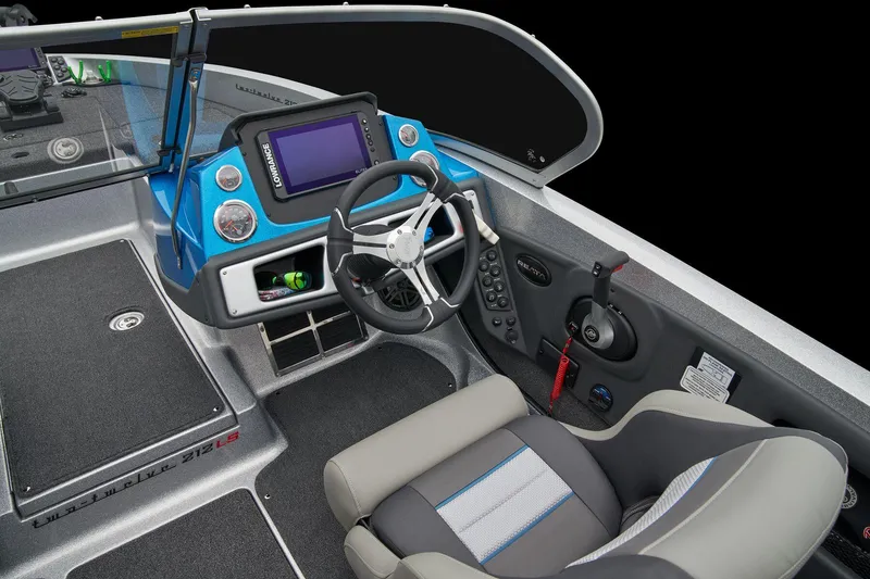 Slide: The Image of Manufacturer Provided Image: 2026 Ranger 212LS boat interior with modern dashboard, steering wheel, and comfortable seating. - 41