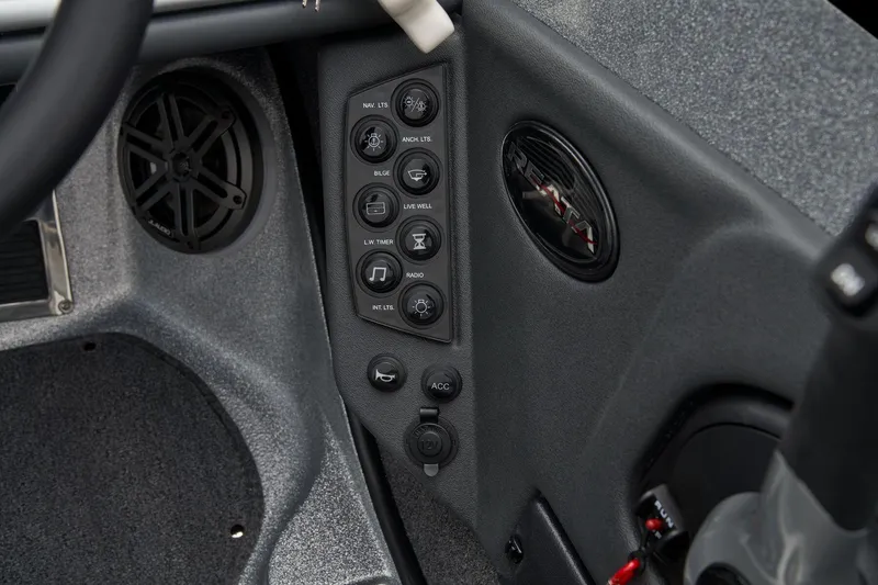 Slide: The Image of Manufacturer Provided Image: Control panel of 2026 Ranger 212LS boat with speaker and various buttons. - 46