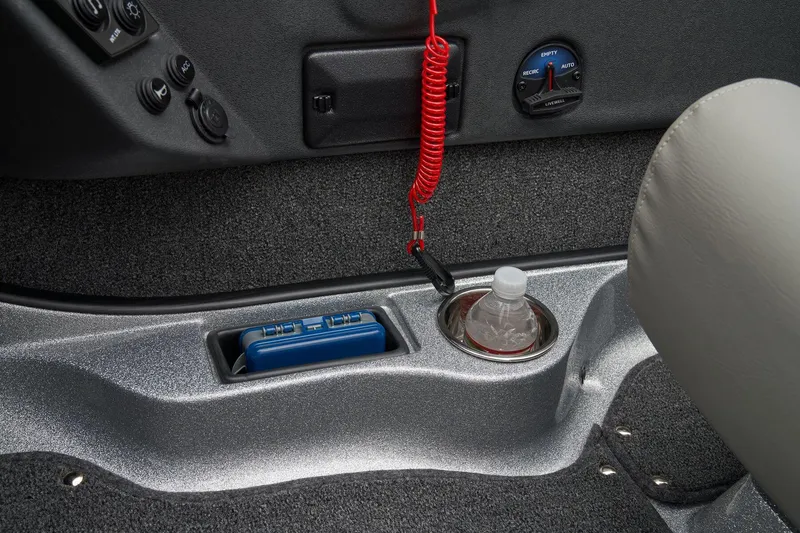 Slide: The Image of Manufacturer Provided Image: Interior of 2026 Ranger 212LS boat with cup holder and control panel. - 47