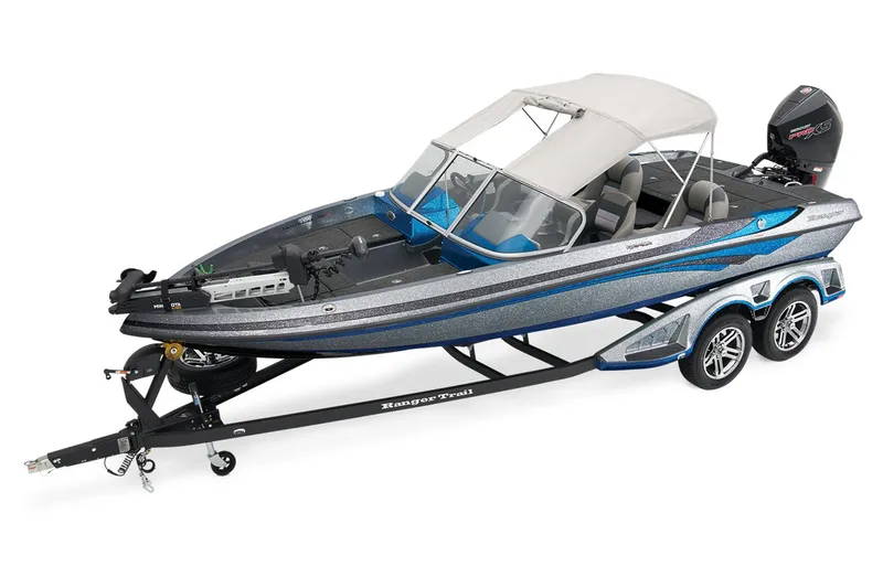 Slide: The Image of Manufacturer Provided Image: 2026 Ranger 212LS boat with canopy on trailer, sleek design, dual axles, and modern features. - 6