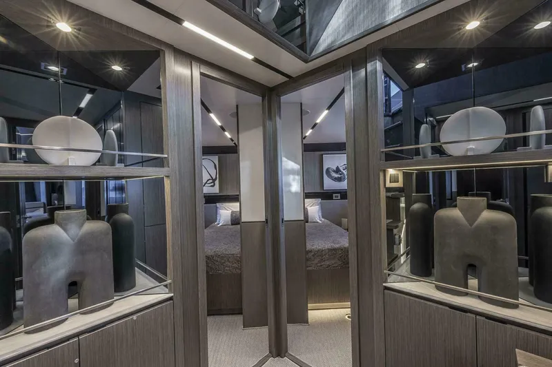 Slide: The Image of Luxurious interior of 2026 Pearl 82 yacht with modern decor and elegant design elements. - 27