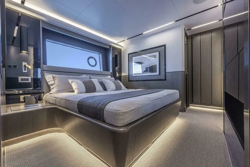 Slide: The Image of Luxurious bedroom interior on Pearl 82 yacht, 2026 model, featuring modern design and ambient lighting. - 32