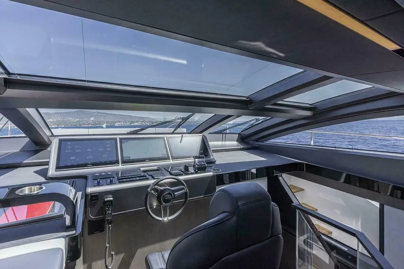 Slide: The Image of Luxurious Pearl 82 yacht cockpit with panoramic windows, advanced navigation systems, and sleek design, 2026 model. - 35