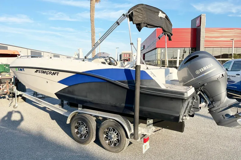 Slide: The Image of 2022 Starcraft SVX 191 OB boat on trailer with Yamaha outboard motor. - 2