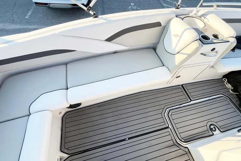 Slide: The Image of 2022 Starcraft SVX 191 OB boat interior with cushioned seating and sleek flooring. - 8