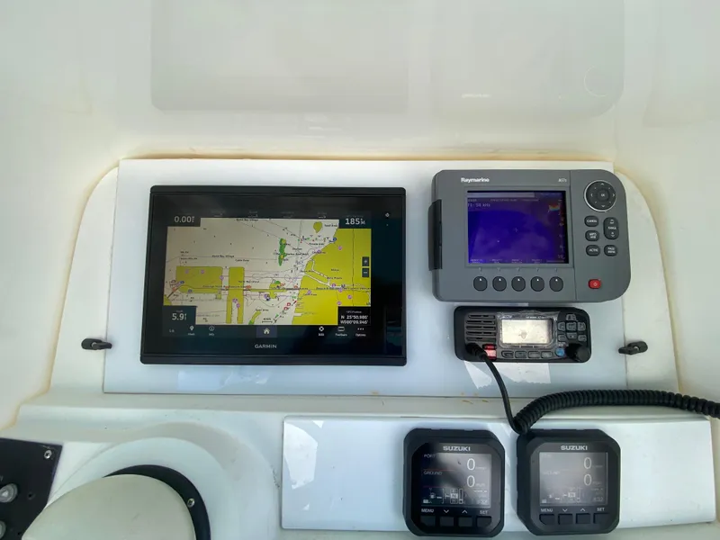 Slide: The Image of White seating area on a 1998 Contender 35 Express boat. - 21