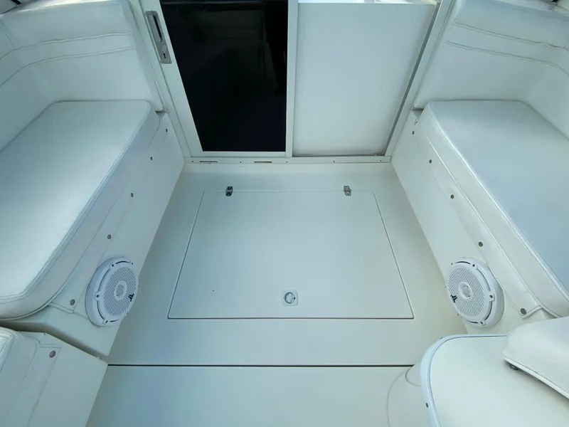 Slide: The Image of Navigation equipment on a 1998 Contender 35 Express boat dashboard. - 26