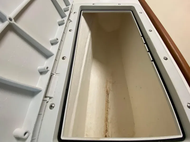 Slide: The Image of Control panel of a 1998 Contender 35 Express boat with fire extinguisher. - 49