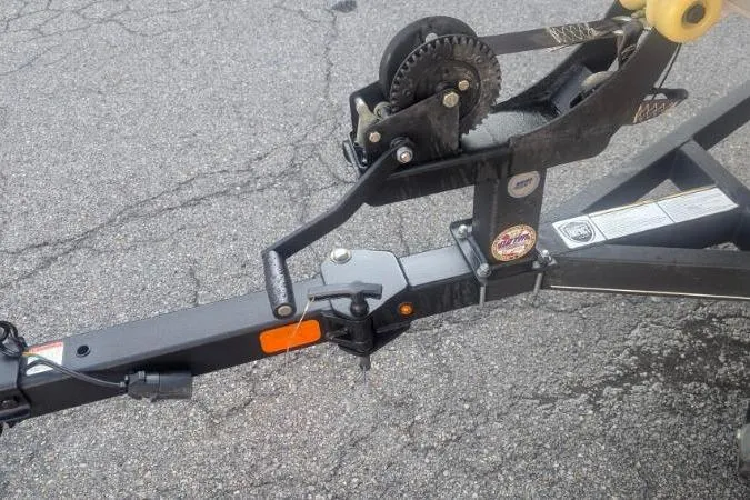 Slide: The Image of Trailer hitch and winch of 2022 Tracker Pro Team 175 TF boat. - 5